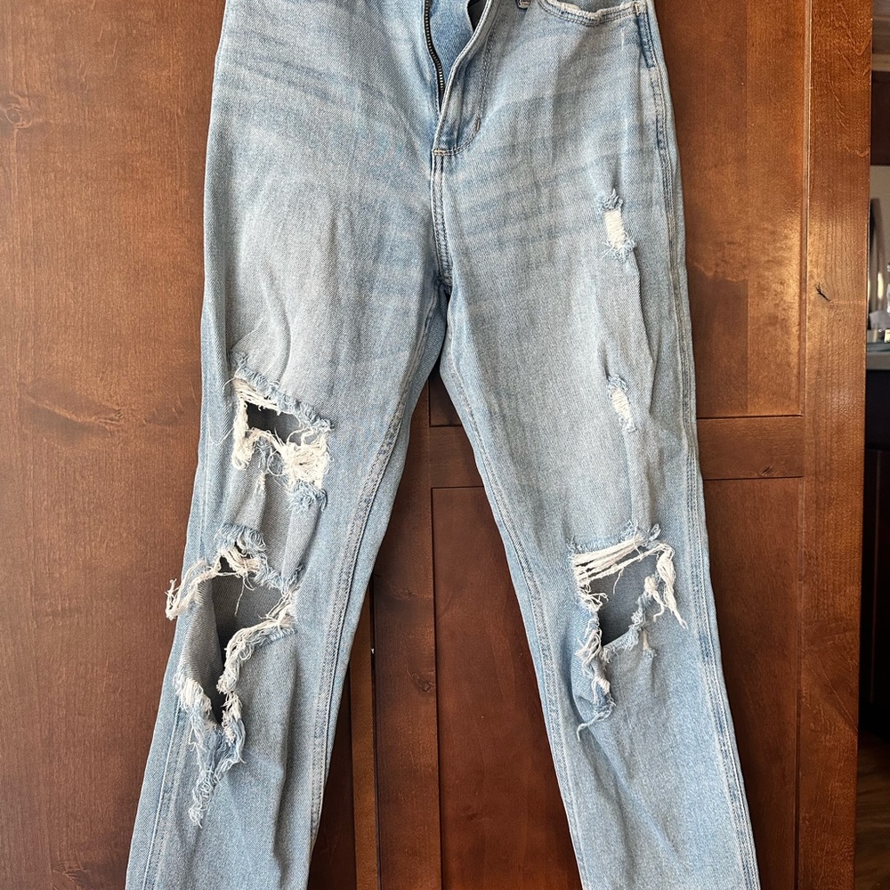 Distressed Light Blue Denim Jeans